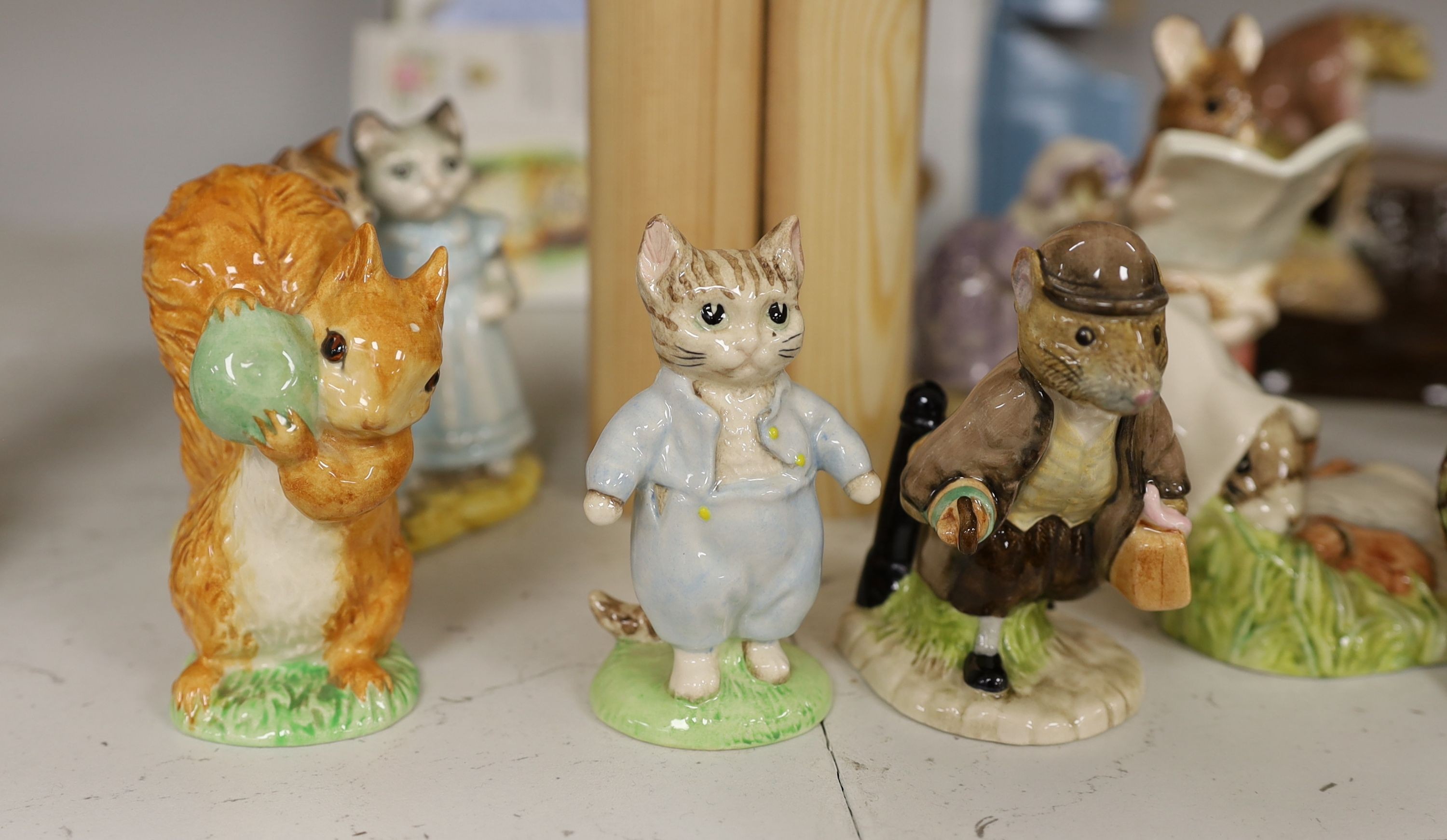 A collection Beswick, Royal Albert and Border Fine Arts Beatrix Potter figures